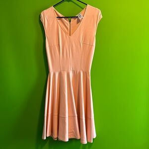 Pink rayon/nylon bar III dress.